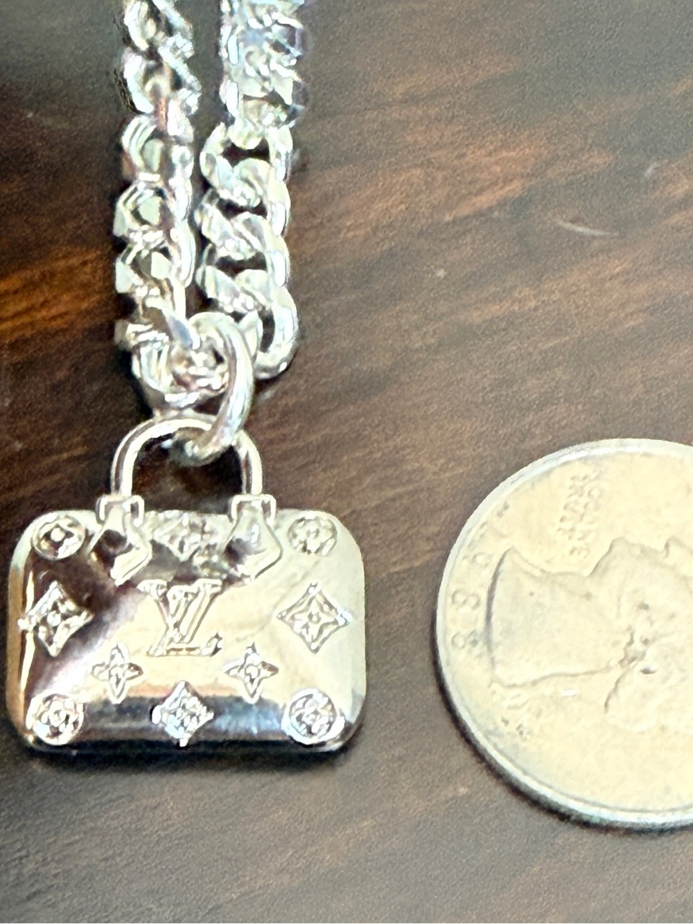 Louis Vuitton EUC Speedy Handbag
Charm on 8” .925 silver plate Cuban
Chain - Picture 7 of 8